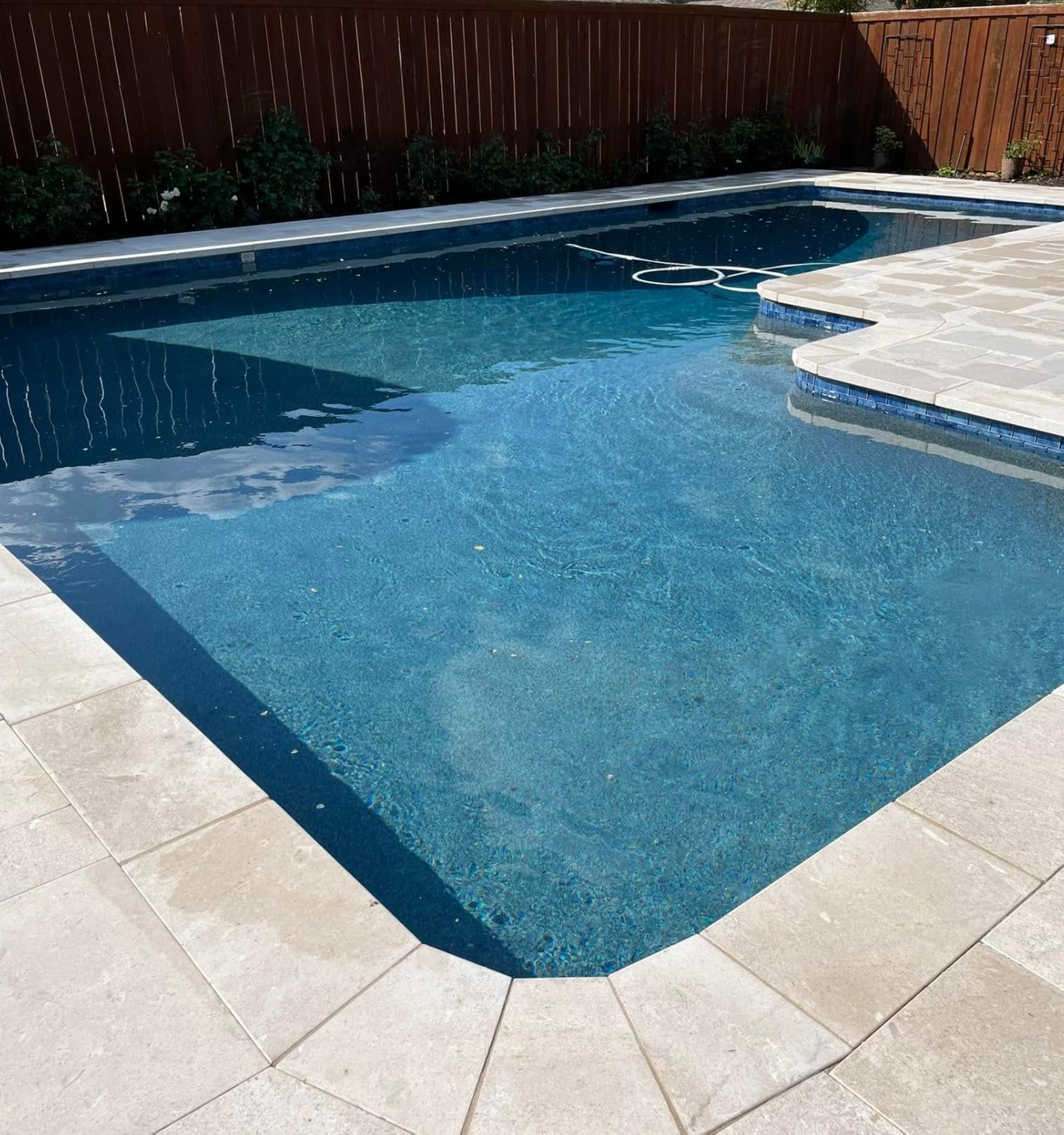 Same Tahoe Blue pebble pool finish filled with water